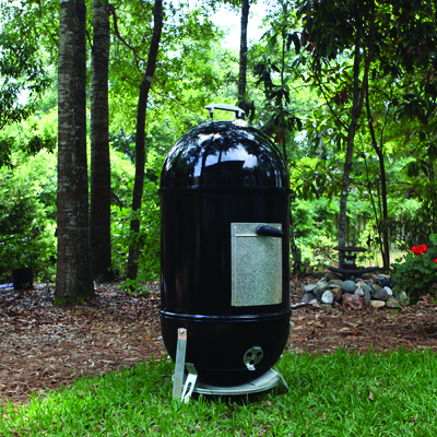 WEBER<sup>&reg;</sup> Smokey Mountain Cooker - As “slow and low” barbecuing becomes more popular, this 18” Smoker is equipped with a lid mounted temperature gauge, silicone temperature grommet, and no rust aluminum door. This gives easy access to the charcoal/ wood chamber and the larger porcelain enameled water pan. Included are (2) plated steel 18” diameter cooking grates. Also, features a porcelain enameled bowl and lid with (4) no rust aluminum vents. 